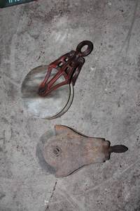 lot 27 image: Vintage Industrial Metal and Wood Pulleys