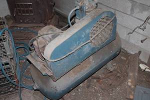lot 46 image: Vintage Cast Iron Stove and Industrial Air Compressor