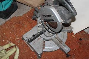 lot 58 image: DeWalt 8-12 Crosscutter Miter Saw