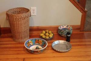 lot 74 image: Lot of Assorted Household Items - Bowls, Basket, Plates, and Coca-Cola Bottle