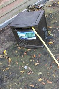 lot 104 image: Suncast Hose Hideaway with 150 ft Slide Trak Hose Guide