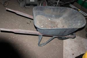 lot 123 image: Used Metal Wheelbarrow for Gardening and Landscaping