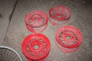 lot 150 image: Set of 4 Vintage Red Metal Wheels with Wire Spokes