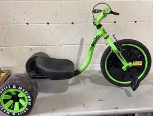 lot 434 image: Huffy Trike Trike Rolling Machine - Green and Black