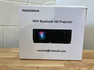 lot 471 image: ROCONIA 5G WiFi Bluetooth 4K Support Native 1080P, 15000LM Full HD Movie Projector