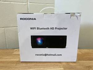 lot 475 image: ROCONIA 5G WiFi Bluetooth 4K Support Native 1080P, 15000LM Full HD Movie Projector