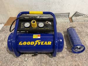 lot 156 image: Goodyear Portable 135 PSI Roll Cage Quiet Air Compressor, 2-Gallon