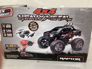 lot 464 image: New Bright (110) Ford F-150 Battery Remote Control Heavy Metal 4X4 Black Truck,