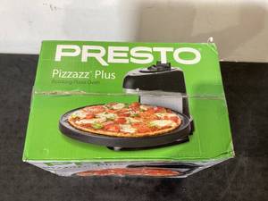 lot 587 image: Presto Pizzazz Plus Rotating Pizza Oven
