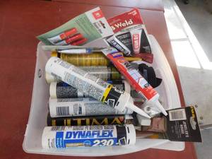 lot 53 image: Lot of a variety of different tubes of sealants, caulk and glue