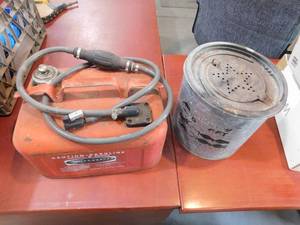 lot 59 image: Boat gas can and bait bucket