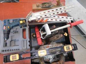 lot 67 image: Lot of tools. Level, wood plainer, Ryobi drill, garage door parts