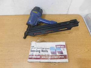 lot 83 image: Pneumatic Framing Nailer With Box of  Nails