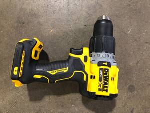 lot 10 image: DEWALT 20V Compact Cordless 12 in. Hammer Drill (Tool Only)  Customer Returns See Pictures