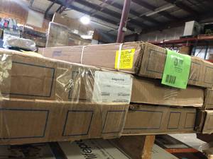 lot 19 image: Pallet with 7 cases of Cap A Tread Dusk Cherry 47 in. L x 12.15 in. W x 2.28 in. T Vinyl Stair Tread and Reversible Riser Kit model customer return see pictures T2-3920-K