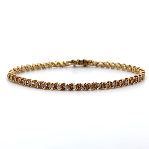 lot 12 image: 0.50 Carat Diamond S-Curve Channel Bar Link Tennis Bracelet in 14k Yellow Gold