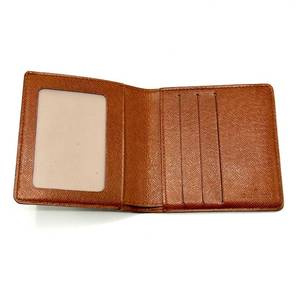 lot 25C image: Louis Vuitton Monogram Leather Bi-Fold Wallet - Authentic $600 Retail