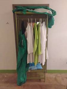 lot 11 image: METAL RACK WITH CLEANING CLOTHING