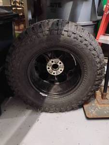 lot 37 image: NEW RIM AND TIRE SIZE LT285 70 R17