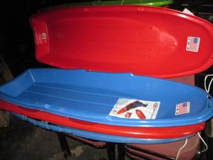 4 Plastic sleds...