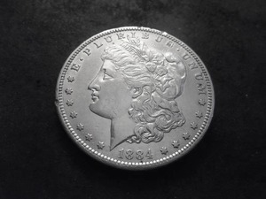 lot 20 image: 1884 S Morgan Silver Dollar