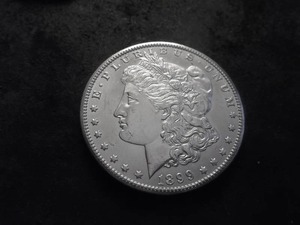lot 38 image: 1899 O Morgan Silver Dollar