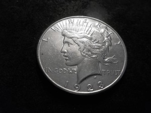 lot 69 image: 1928 S Peace Silver Dollar