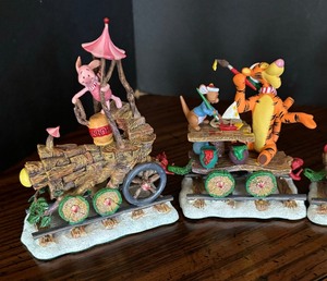 lot 39 image: The Danbury Mint Disney Piglet Holiday Express Figurines