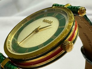 lot 119 image: GUCCI Shelly Line Green Watch
