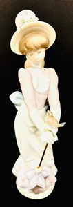 lot 51 image: Lladro Dulce Paseo Garden Song Porcelain Figurine No. 7618
