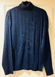 lot 240 image: Barry Bricken Three Turtleneck Sweaters in Blue, Cream and Red