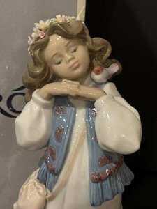 lot 133 image: Lladro Dreams of Summer Past Porcelain Figurine 06401