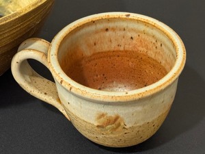 lot 146 image: Artisan Crafted Pottery Bowl and Mug Strainer
