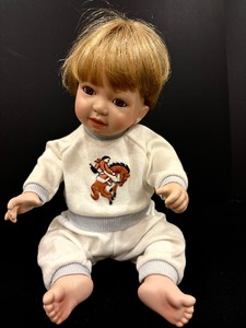 lot 73 image: Vintage 191 Allison Doll Boy With Wooden Horse  Danbury Mint Cuddly Kids with Original Box