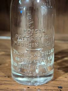 lot 291 image: Vintage Edison Battery Oil Bottles