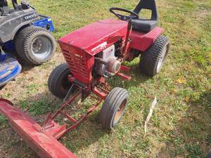 lot 114 image: Wheel horse tractor with tecumseh engine and front blade