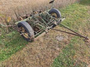 lot 118 image: John deere 2 row planter with markers and seed boxes