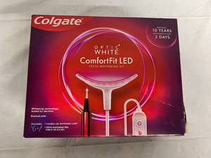 lot 16 image: Colgate Optic White ComfortFit LED Teeth Whitening Kit