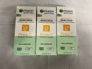 lot 18 image: 3 Bottles of Garnier Brightening Serum Cream