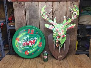 lot 152 image: Mt Dew Hanging Clock & Deer Head