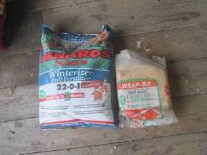 lot 99 image: (G1) Menards Fall fertilizer and wr...