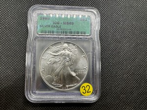 lot 32 image: 1986 American Silver Eagle ICG MS69  First Year Of Issue
