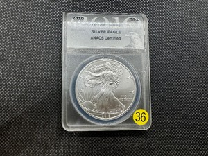 lot 36 image: 2010 American Silver Eagle ANACS MS69