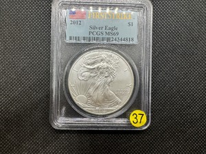 lot 37 image: 2012 American Silver Eagle FIRST STRIKE PCGS MS69 - PCGS Price Guide is $58