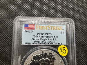 lot 45 image: 2011-P American Silver Eagle 25th Anniv. FIRST STRIKE Reverse Proof PCGS PR69 - PCGS Price Guide is $45