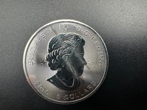 lot 56 image: 2016  BU One Ounce .9999 Silver Canada Superman Coin