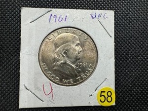 lot 58 image: 1961 Silver Franklin Half Dollar Marked UNC When Purchased