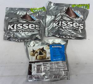 lot 148 image: KK. 10.8oz 3x 10.78oz Hersheys Kiss-Milk Chocolate