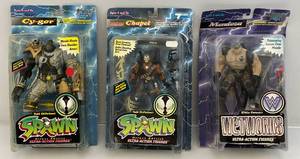 lot 11 image: Misc. McFarlanes Action Figures (NOC) Cards Are Beat Up