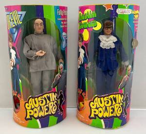lot 12 image: Misc. Austin Powers Action Figures (NIP) Package Beat Up A Little